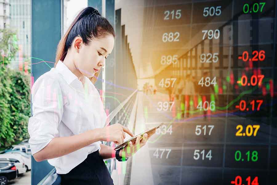 lady analysing financial stocks